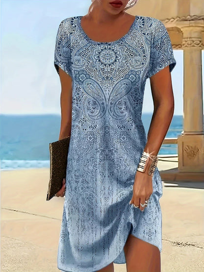 Women's midi dress – relaxed fit – patterned design – short sleeve – asymmetrical hem