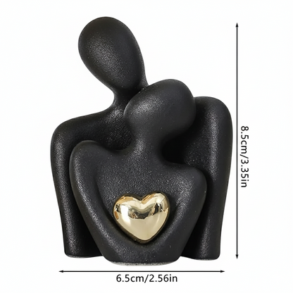 Modern Abstract Sculpture With Metallic Heart Accent