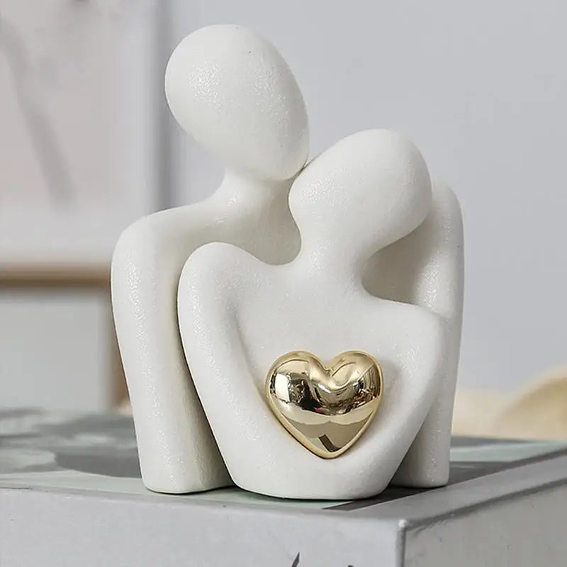 Modern Abstract Sculpture With Metallic Heart Accent