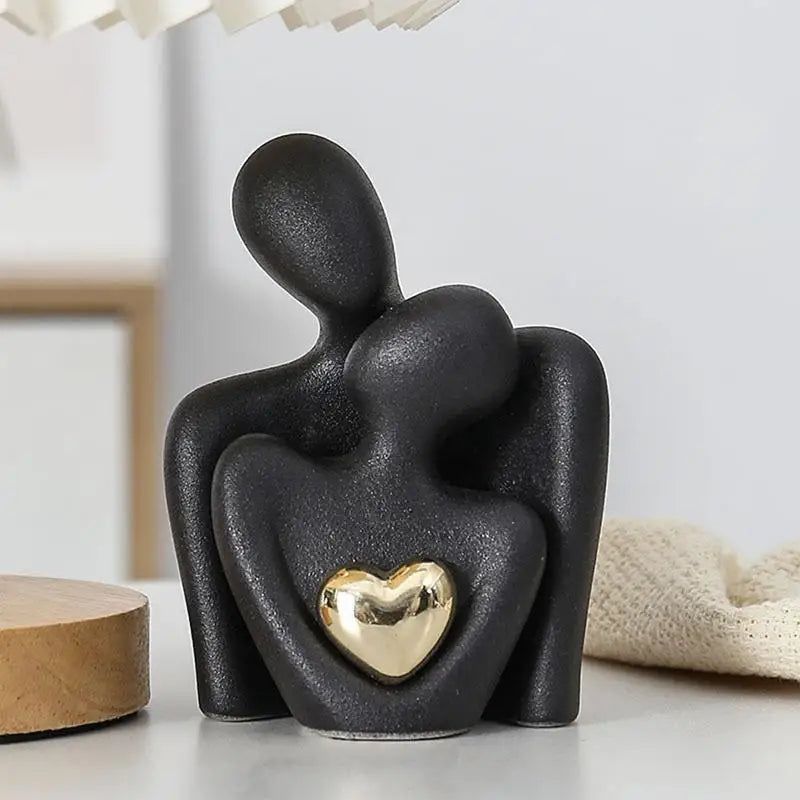 Modern Abstract Sculpture With Metallic Heart Accent