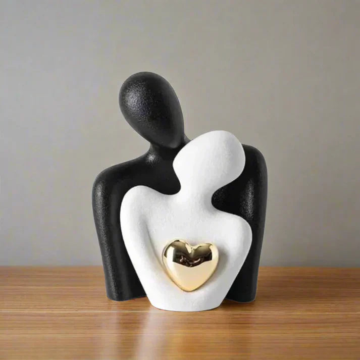 Modern Abstract Sculpture With Metallic Heart Accent